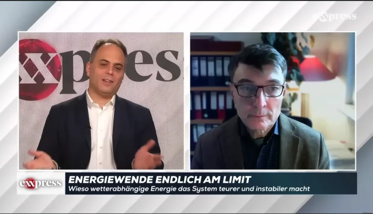 Dr. Björn Peters im exxpress-Interview. Die Bauchbinde verrät die Stoßrichtung: „Energiewende ENDLICH am Limit".